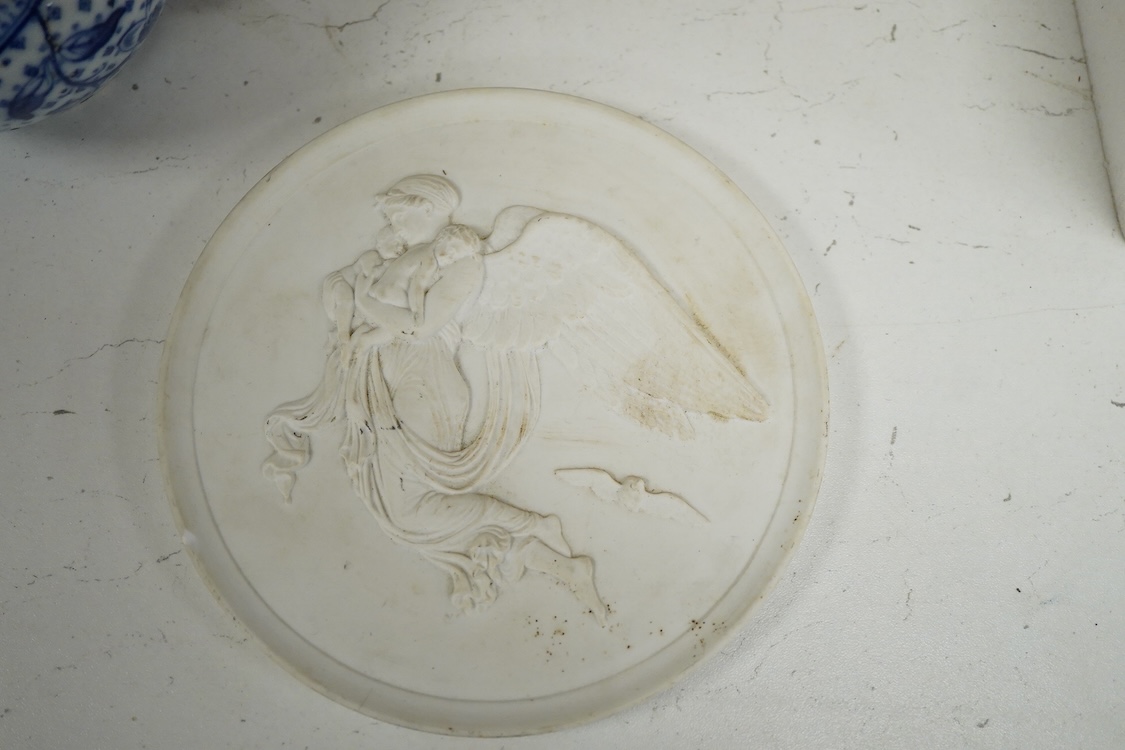 A pair of Copenhagen biscuit relief plaques of Night and Day, after Thorvaldsen, 15cm diameter, plus two pairs of vases, a blue and white plate and teapot (8)